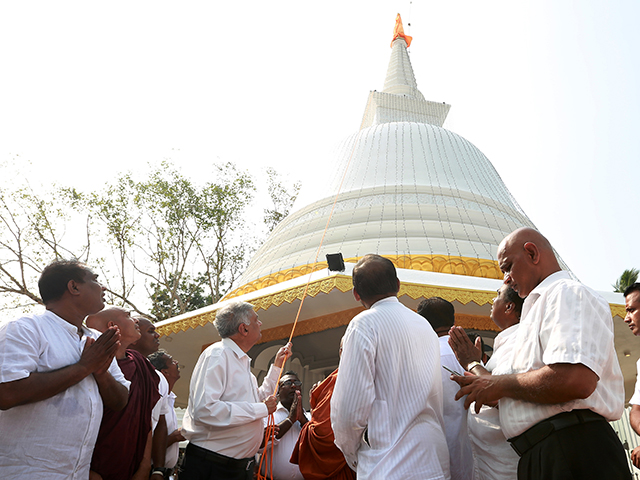 ranil at buddhist stupa