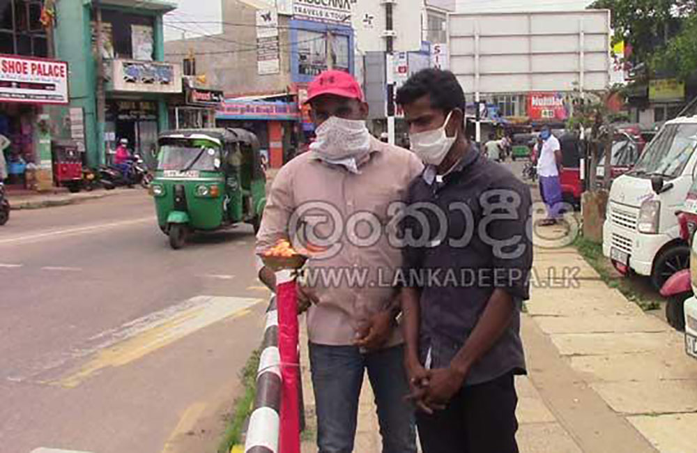 යුද්ධයෙන් මිය ගිය පිරිස් සිහිකර  පහන් දැල්වූ දෙදෙනෙක් අත්අඩංගුවට  !